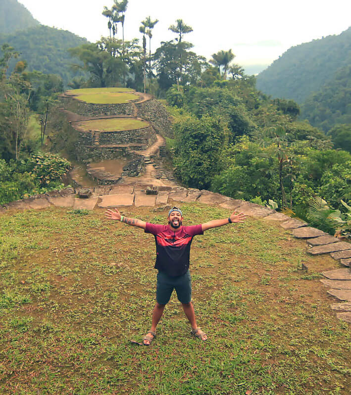 Luxury trekking group celebrating at Ciudad Perdida with private guide and premium gear